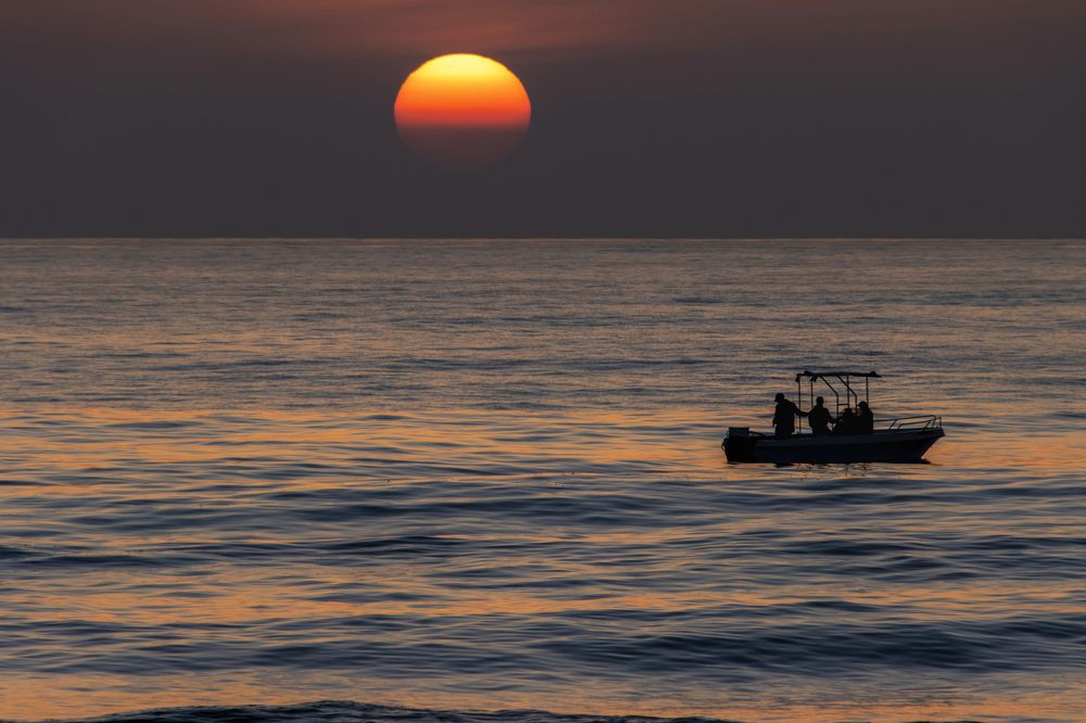 Pescadores al atardecer