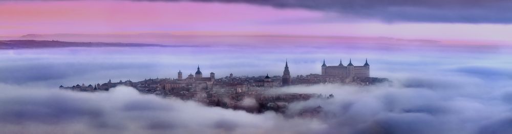The old city of Toledo between the mist