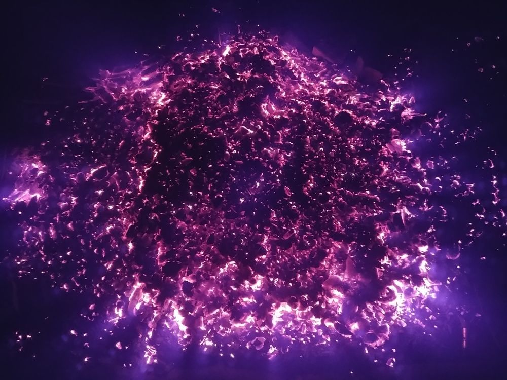 The universe of a dying campfire