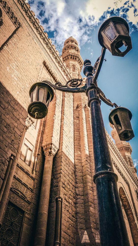 Tall Minaret behind old Street Lamp