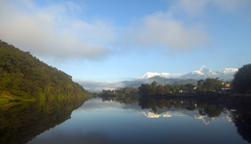 Reflections of the Annapurna Range in Phewa Lake, Pokhara, Nepal