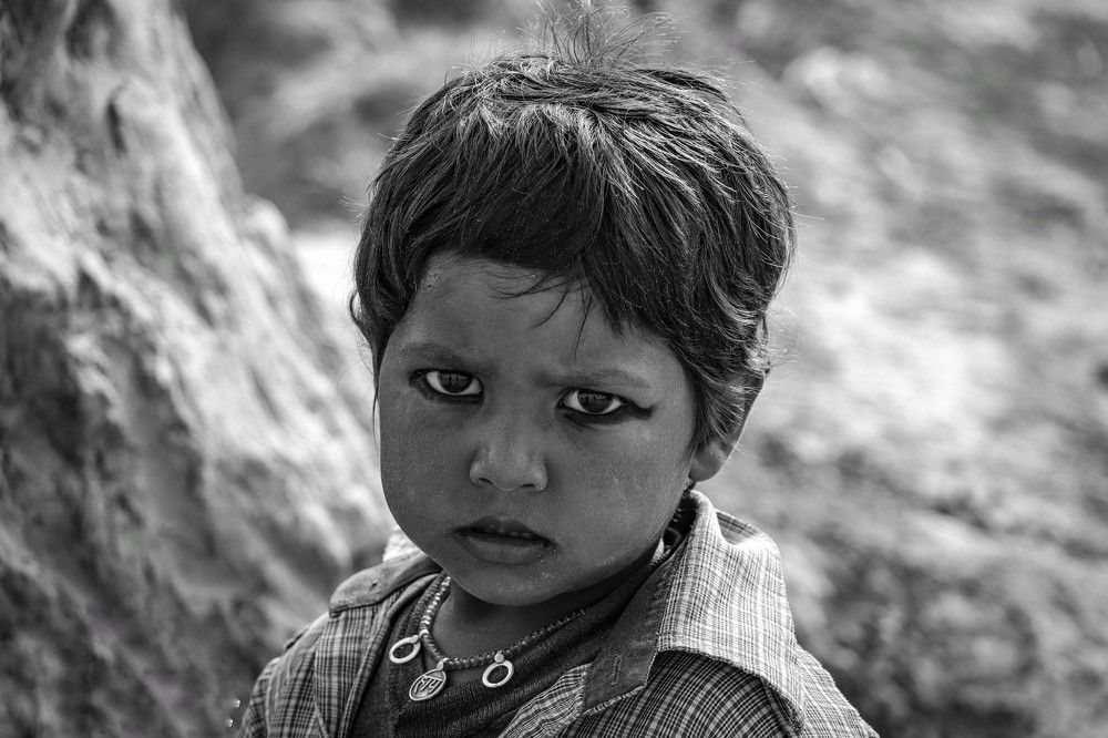 sand on his body fire in his eyes