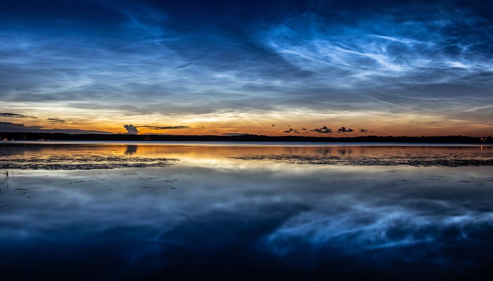 Noctilucent clouds.