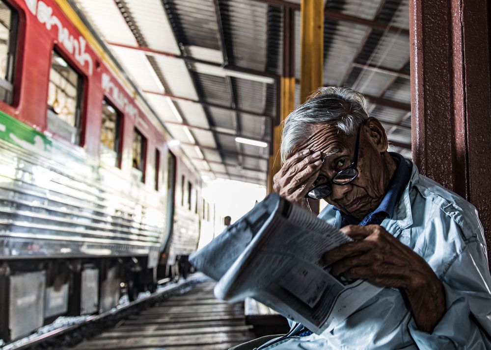Old man at the train station