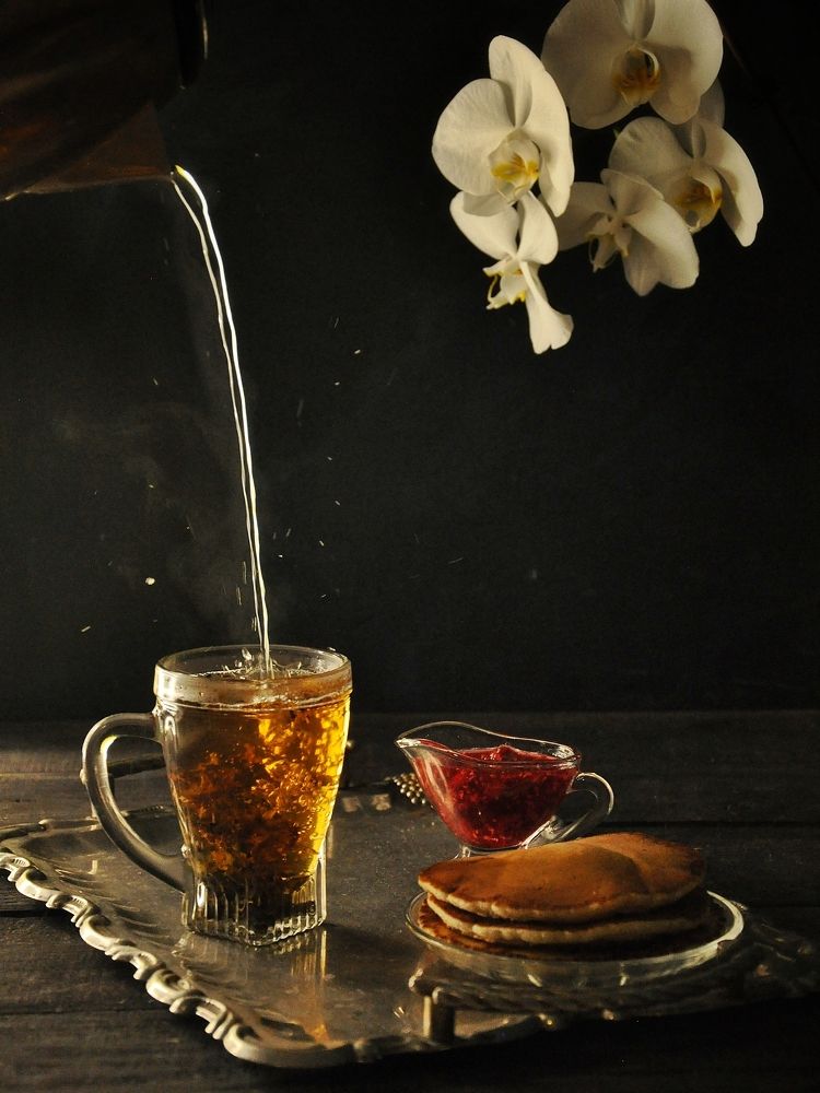 A cup filled with hot tea.