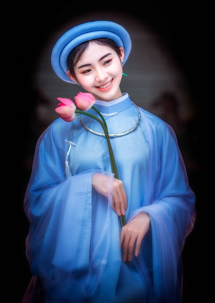 Vietnamese girl with national classic costumes