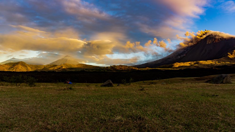 Sunrise in guatemala surrounded by volcanoes