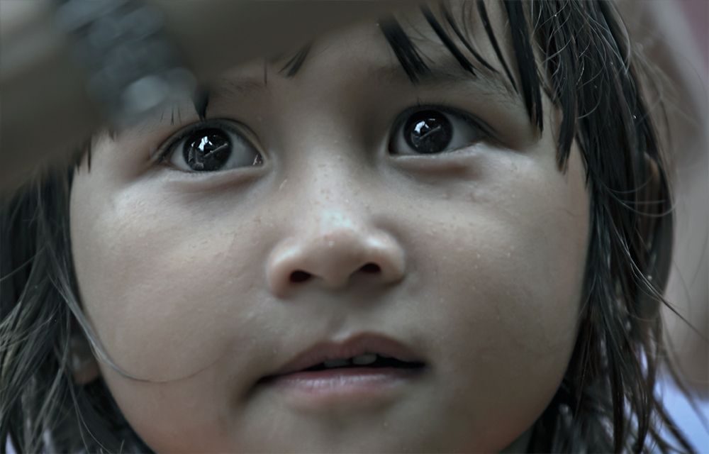 Little girl went out in spite of the rain