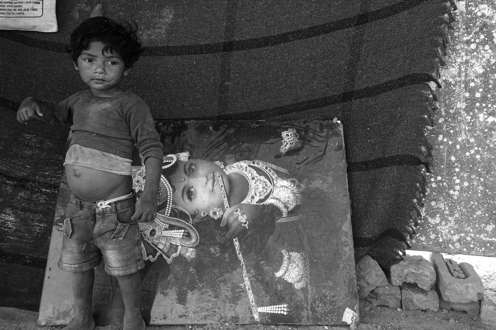 Black and white poor child