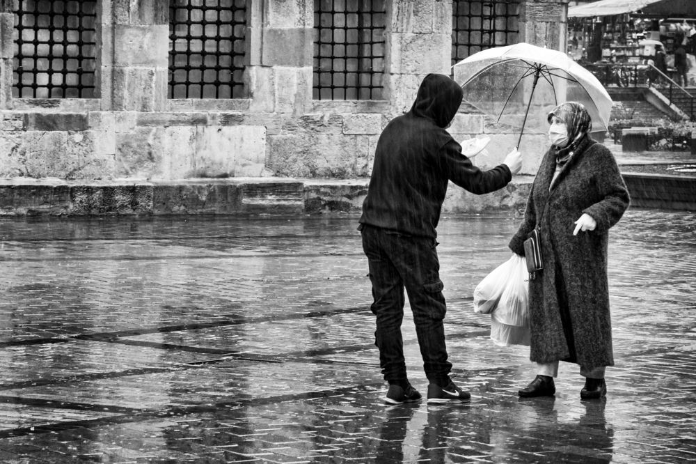 Old woman and umbrella