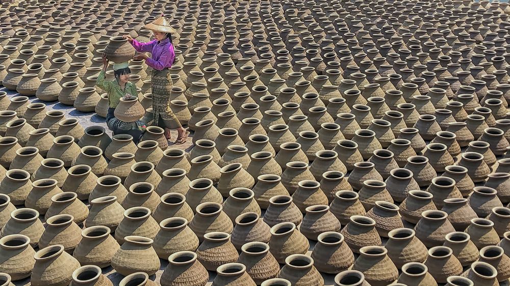 preparing to arrange pots
