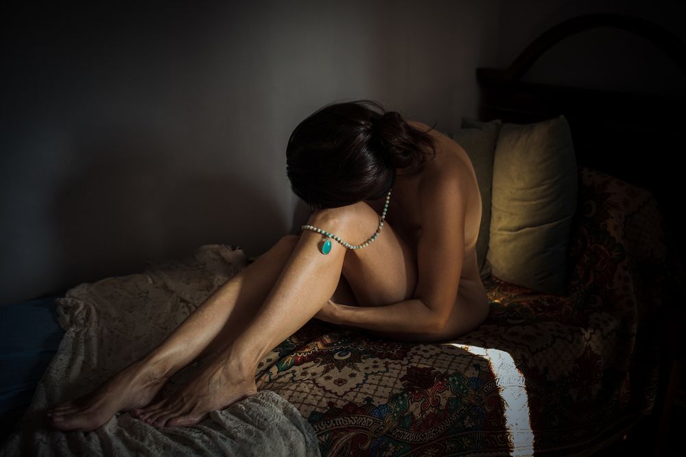 A girl with a turquoise necklace