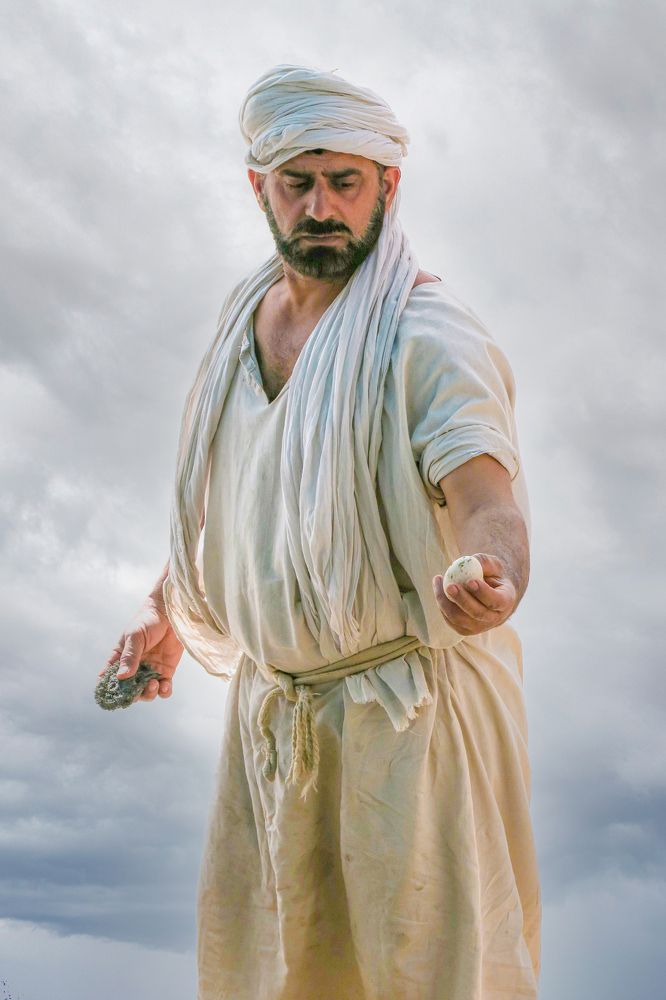 One hand gives food, the other hand defends.