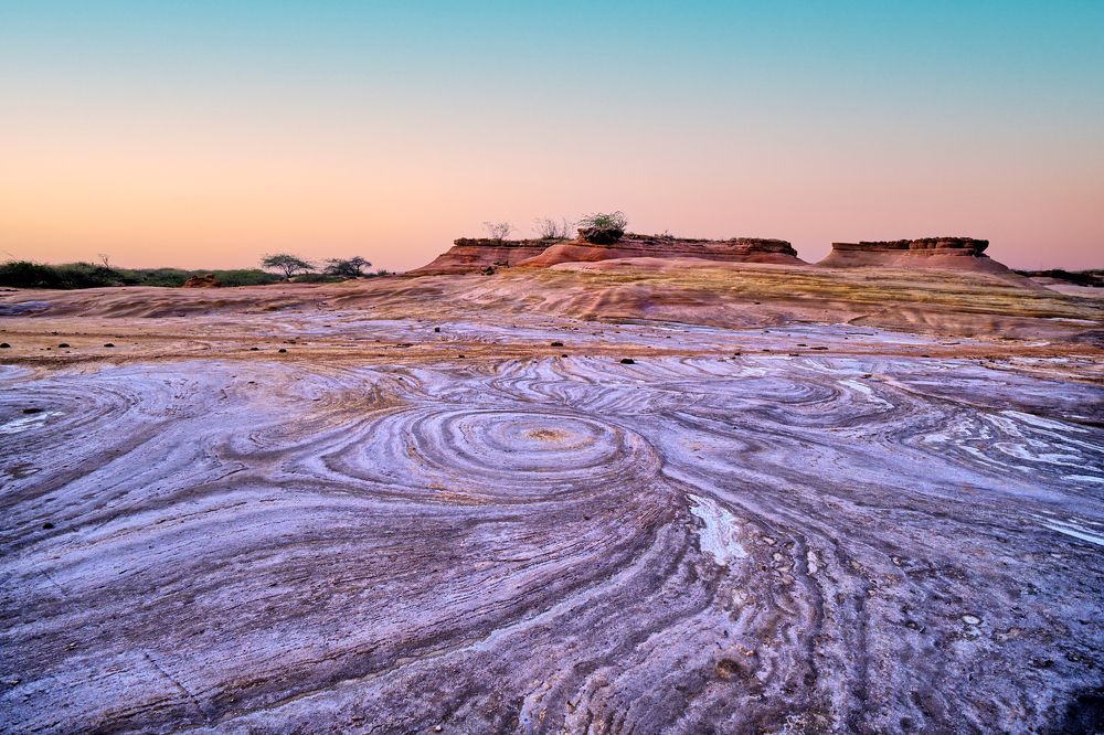 Whirlpool pattern created by weathering of rock.