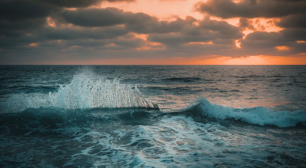 Breaking Wave at Sunset