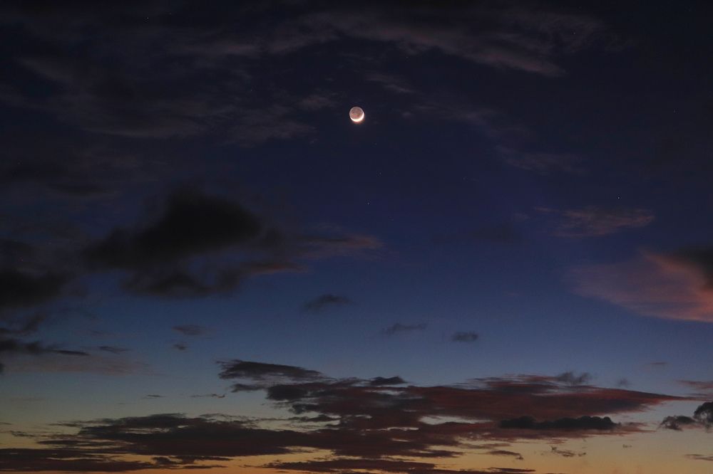 Clouds with Crescent Moon