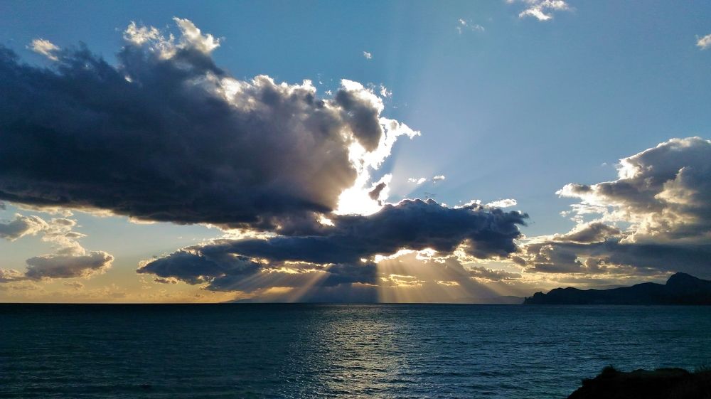 Игра солнца с облаками