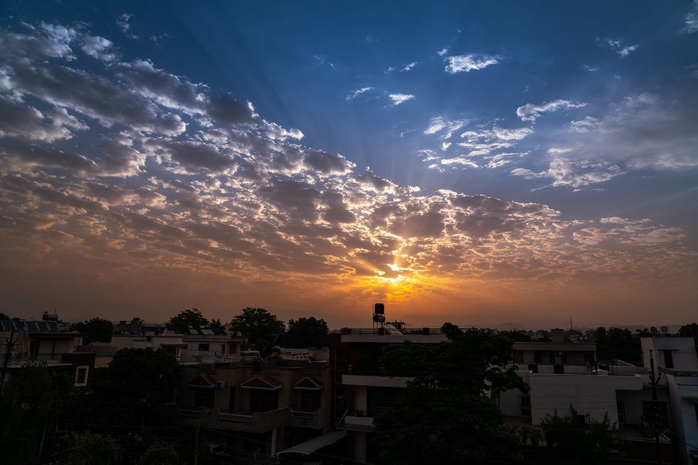 Sun rise behind the cloud