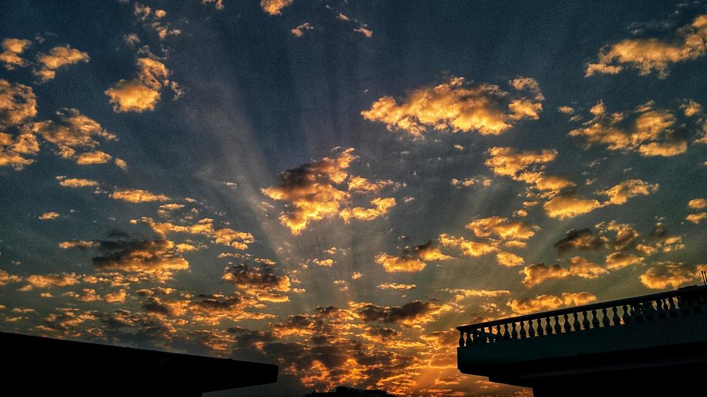 Radiating light among the clouds