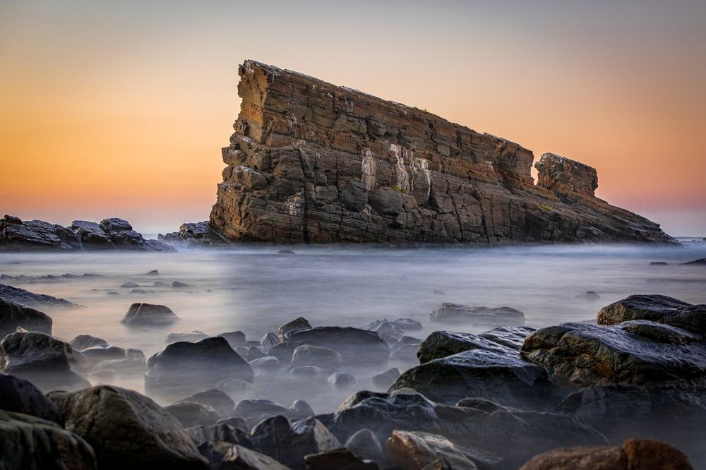 The sunset and the rock