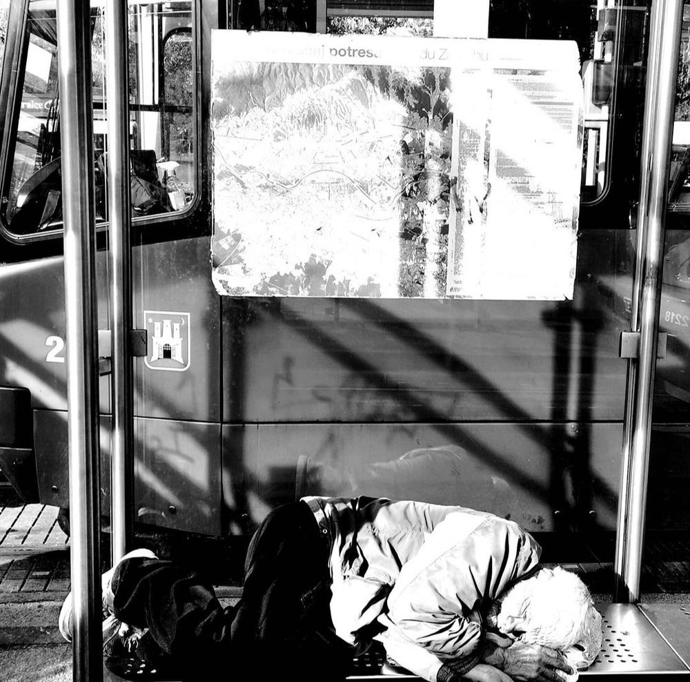 Hobo on a tram station