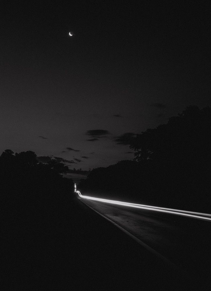 light trail and half moon.