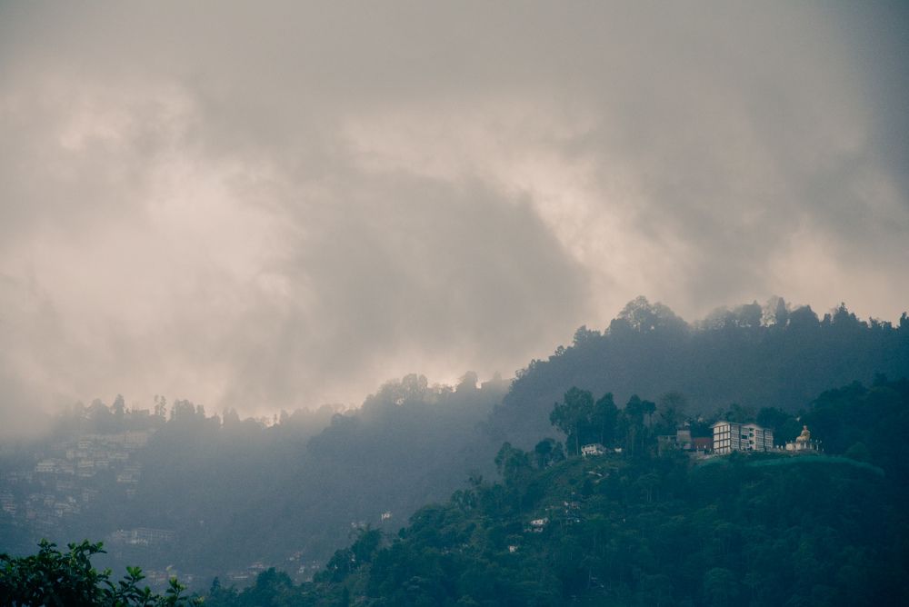 The mountain sleeps leaning against the sky...