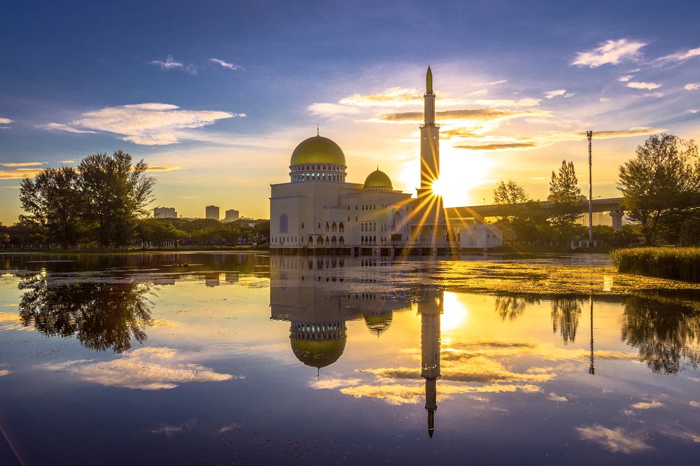 Bursting Sun over calm Puchong Mosque, Malaysia