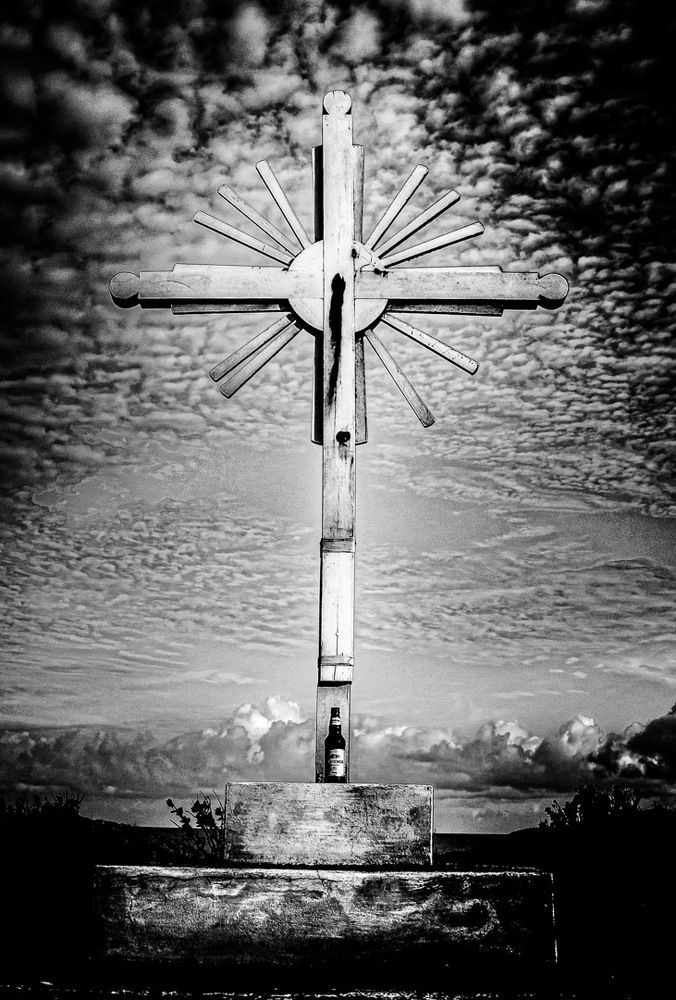 At the foot of the holy cross