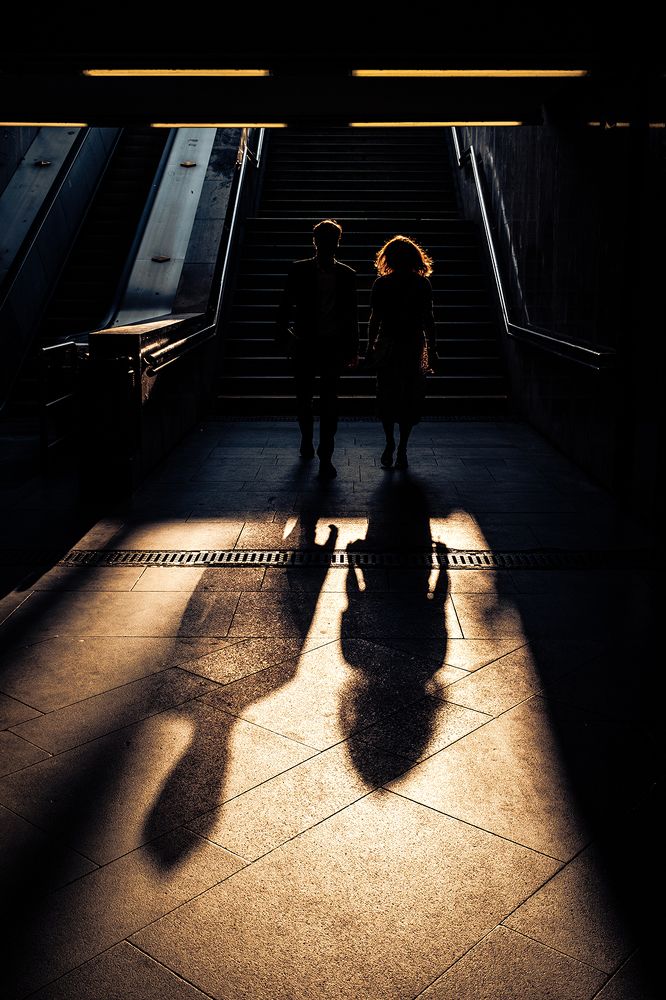 Two people and two shadows.