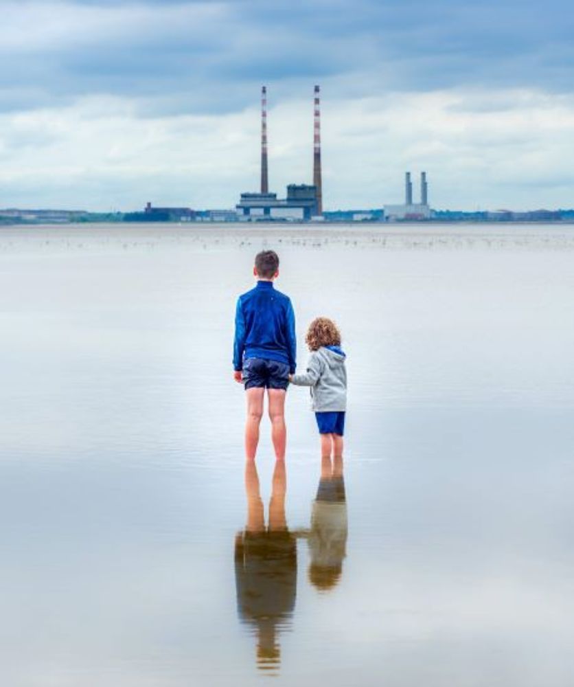 Kids looking at Poolbeg Towers