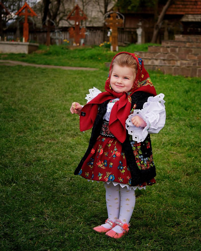 The little girl proud of her clothes - Maramures, Romania