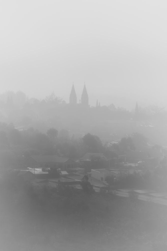 Lonely church in misty morning