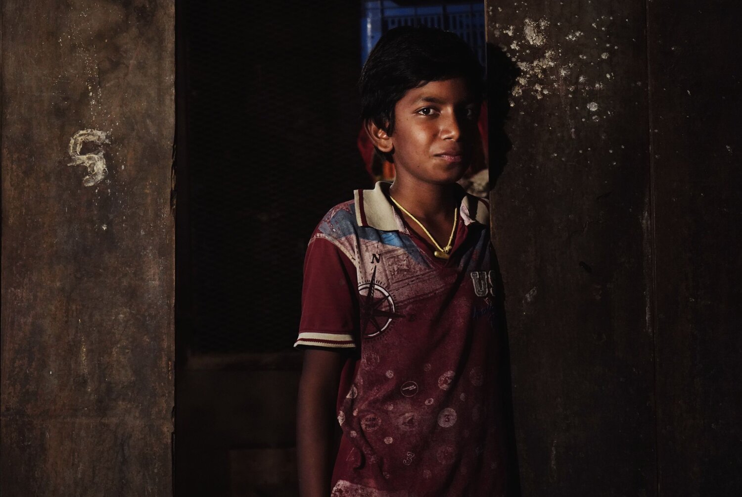 Portrait of a young boy from the streets of Mysore.