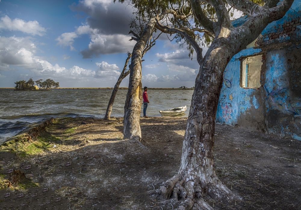 a man with boat at nile river