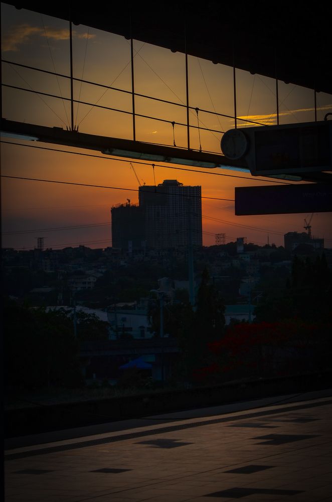 SUNSET AT THE BACK OF THE BUILDING