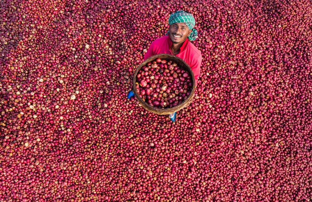A happy smile of a potato seller