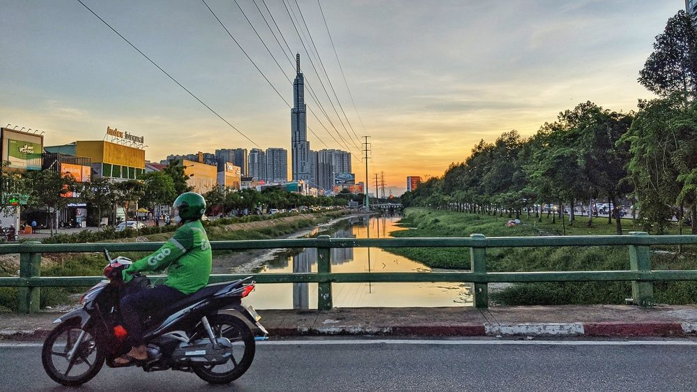 Travel across the city of Saigon at sunset