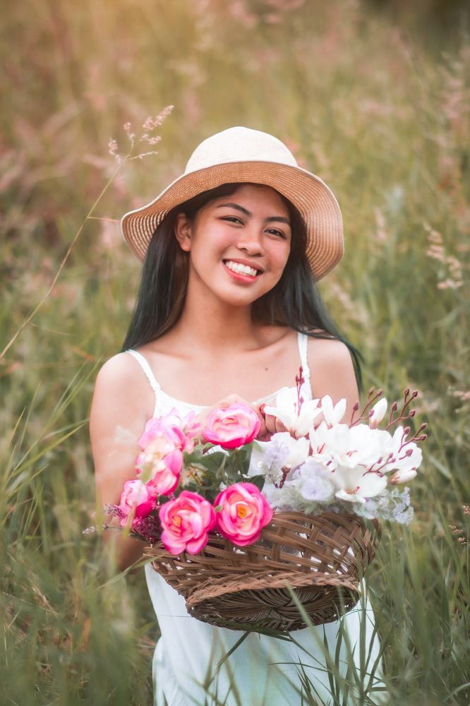A girl with flower basket