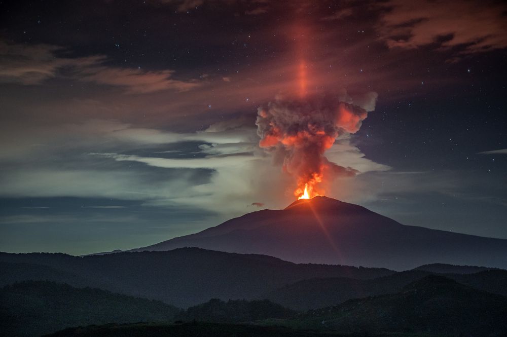 Light pillar on volcano Etna