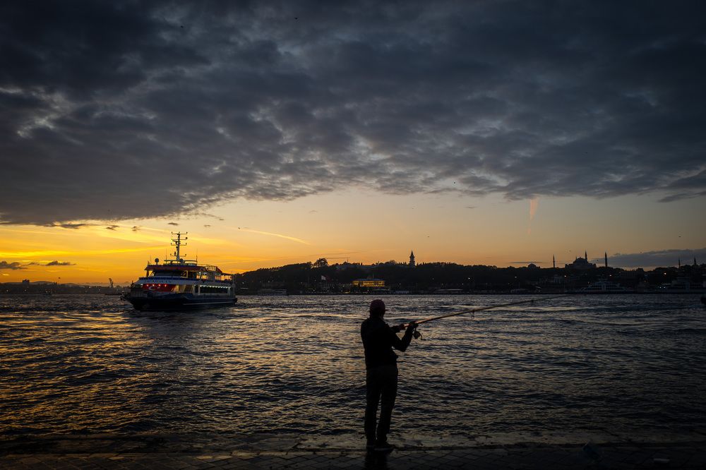 Angler in the sunset