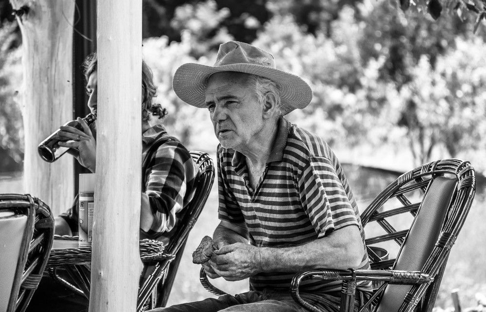 An old man with a mushroom