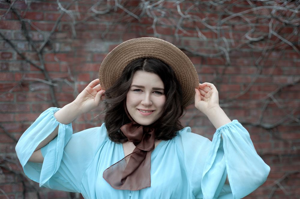 Женщина в шляпе.