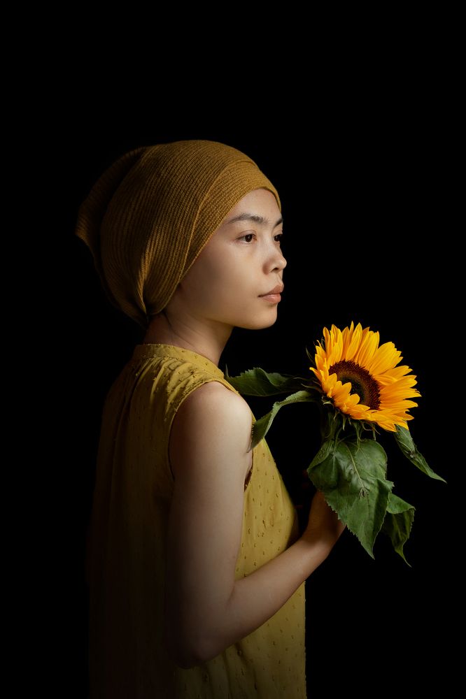 Self portrait with sunflower