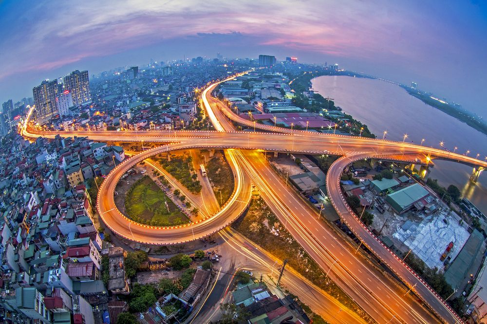 Vinh Tuy bridge intersection at sunset