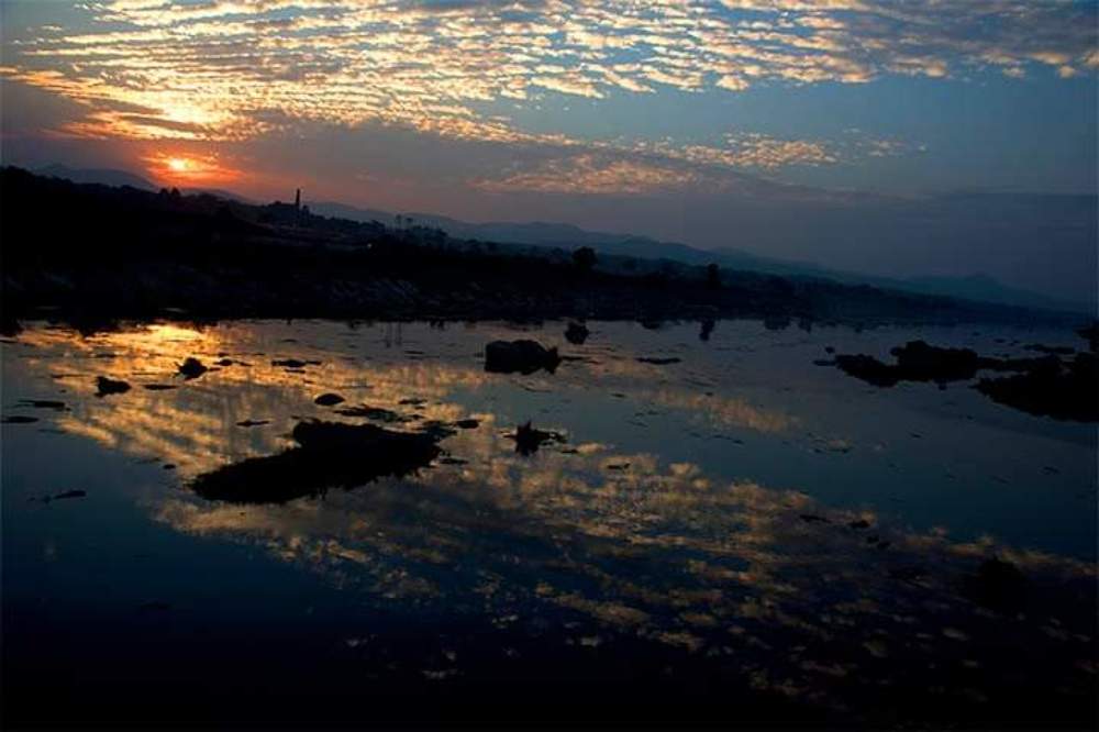 Sunset on riverbank