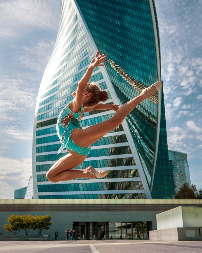 Young gymnast in Moscow city