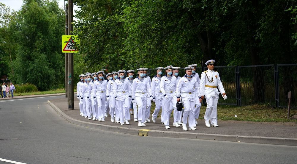 russian sailors return from a parade in the city of Kronstadt