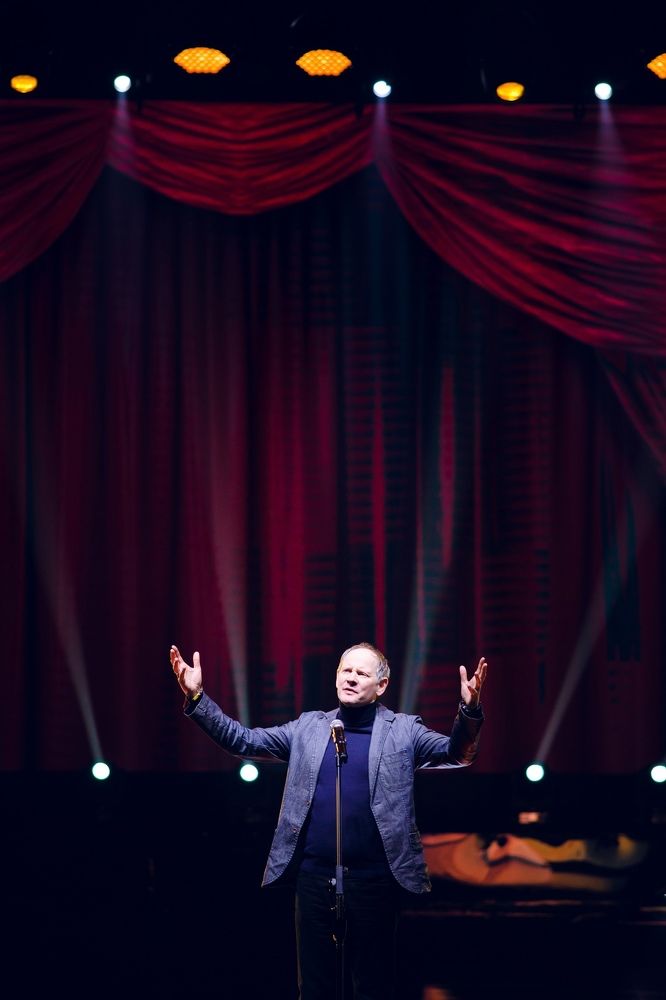 The clamor ceased. I walked onto the stage.