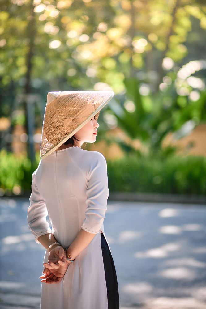 Woman with Vietnamese traditional hat
